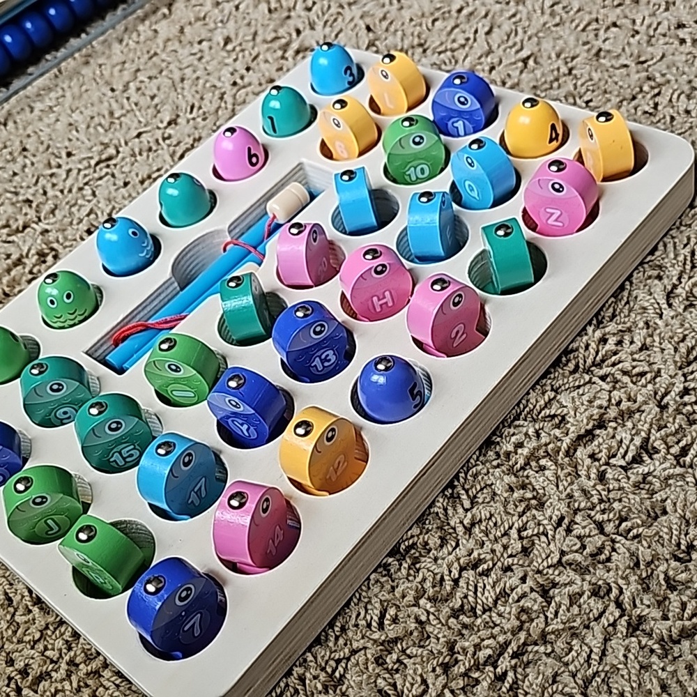 Wooden fishing game with letters and numbers